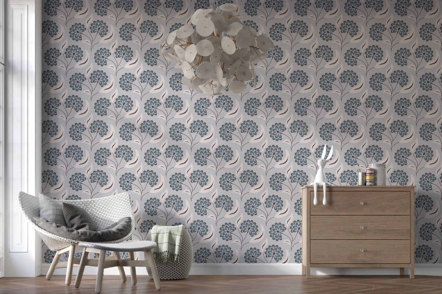 Serene Blooms wallpaper with blue floral pattern beside a wood dresser and white chandelier