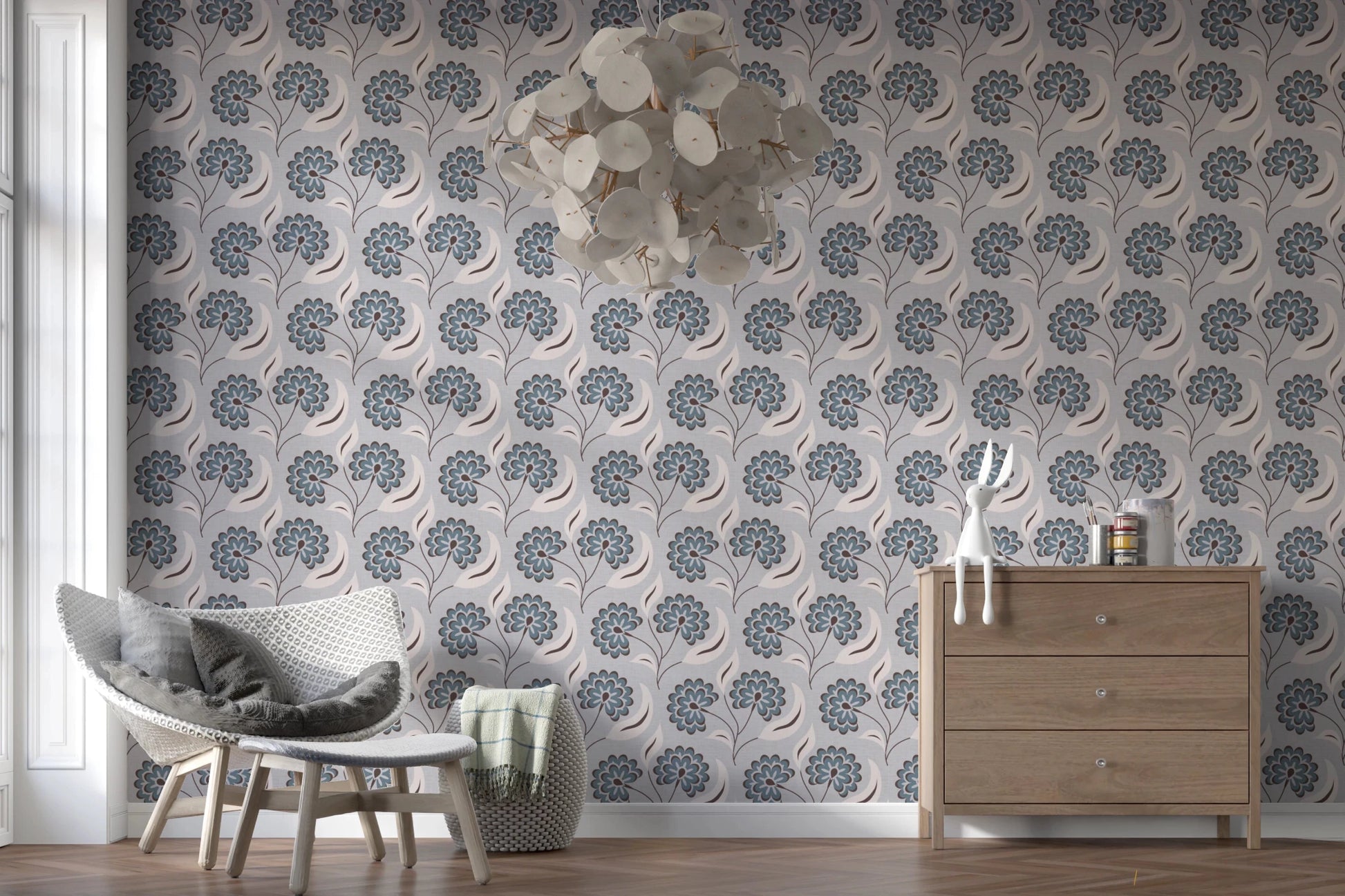 Serene Blooms wallpaper with blue floral pattern beside a wood dresser and white chandelier
