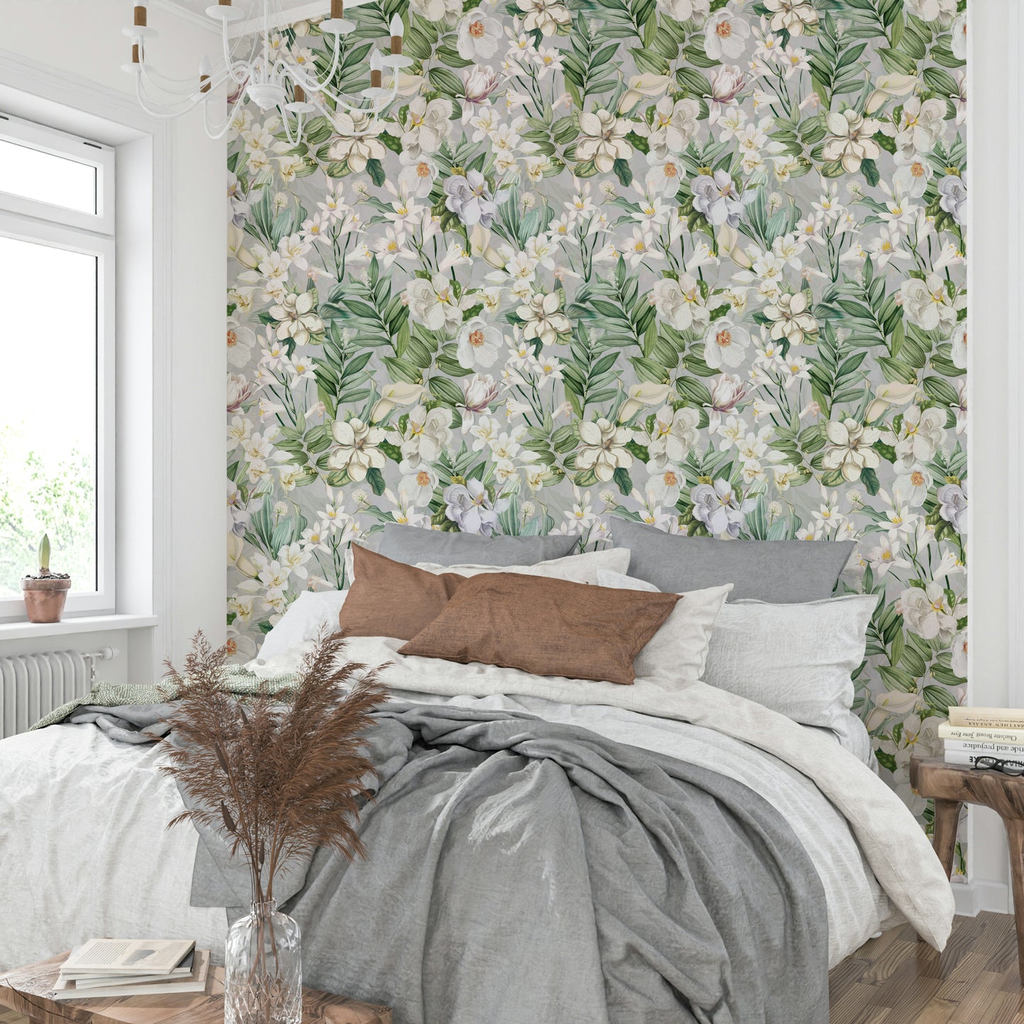 Floral wallpaper mural with soft pastel tones and gentle leaves.

