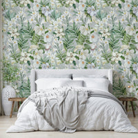 Nature-inspired floral wallpaper with soft hues and lush greenery.

