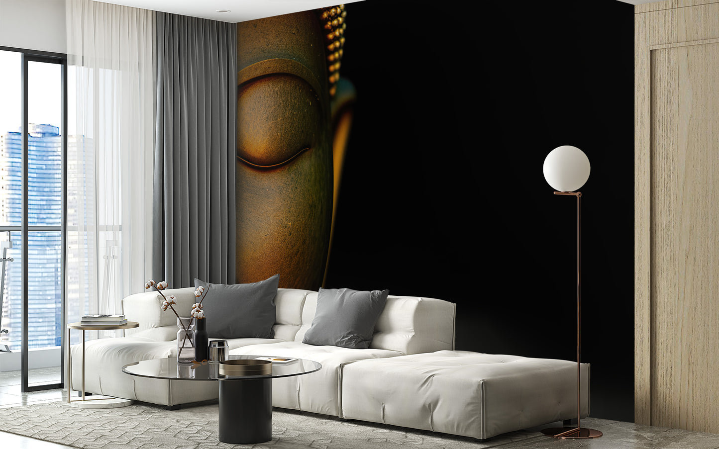 Serene Buddha Sculpted Portrait wallpaper mural on black behind a white sectional sofa and glass coffee table in a living room