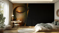 Serene Buddha Sculpted Portrait wallpaper mural on a dark wall in a bedroom with sage and white bedding and a wood desk