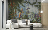 Peaceful Forest wallpaper mural of jungle greenery and distant mountains behind a white sectional sofa in a living room