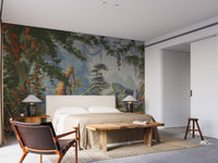 Peaceful Forest wallpaper mural of a lush forest landscape behind a beige bed with a live-edge wood bench in a bedroom