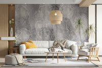 An artistic moody cloudscape mural on minimalist wallpaper.

