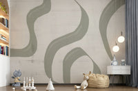 Subtle Stream wallpaper mural in sage and cream in a kids room with toys, white dresser and globe pendants