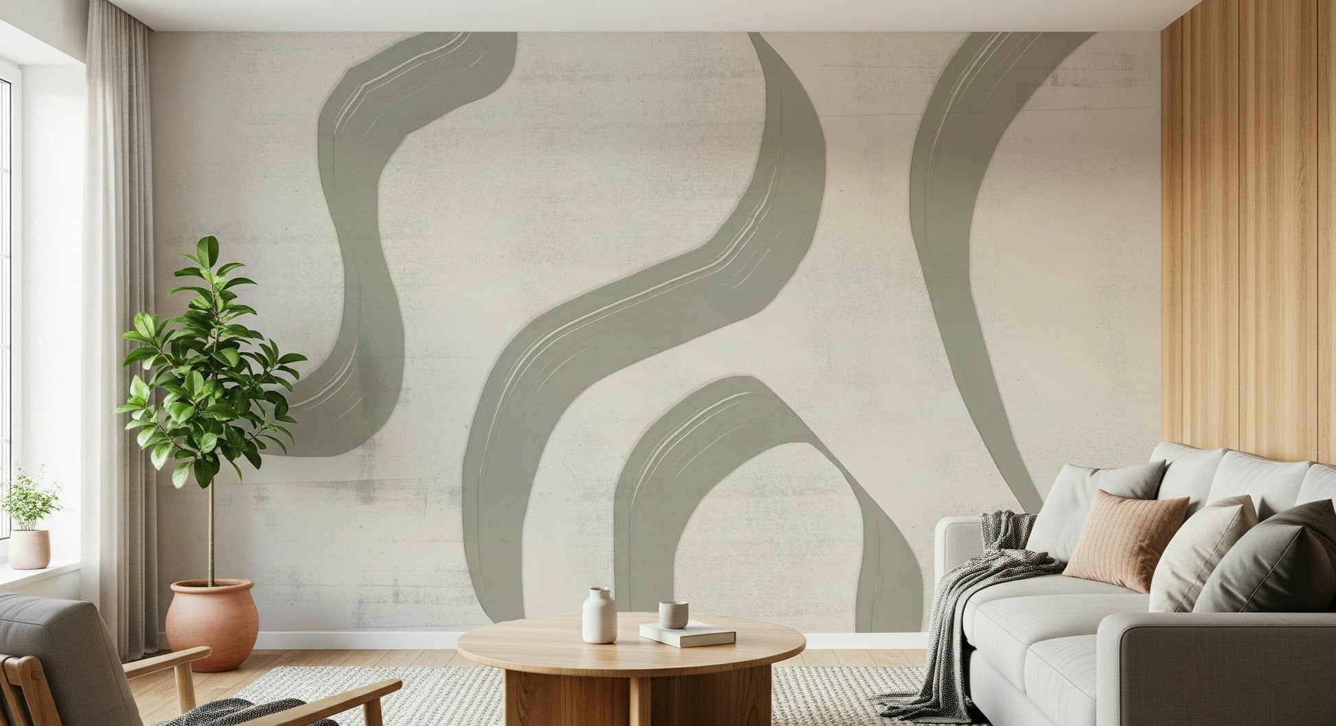 Subtle Stream wallpaper mural in sage and cream behind a grey sofa with rubber plant and wood-slat wall
