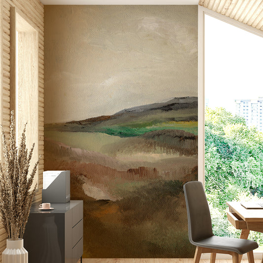 Serene Hillscape wallpaper mural in a home office behind a grey desk with dried pampas grass and a bright window