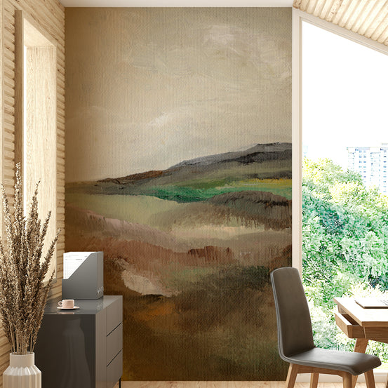 Serene Hillscape wallpaper mural in a home office behind a grey desk with dried pampas grass and a bright window