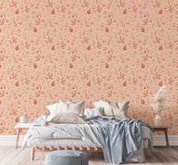 Serene Peach Tropical Garden wallpaper above a platform bed with neutral bedding and pampas grass