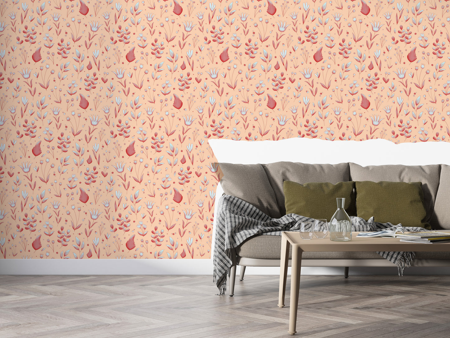 Serene Peach Tropical Garden wallpaper behind a grey sofa with olive cushions and a wood coffee table