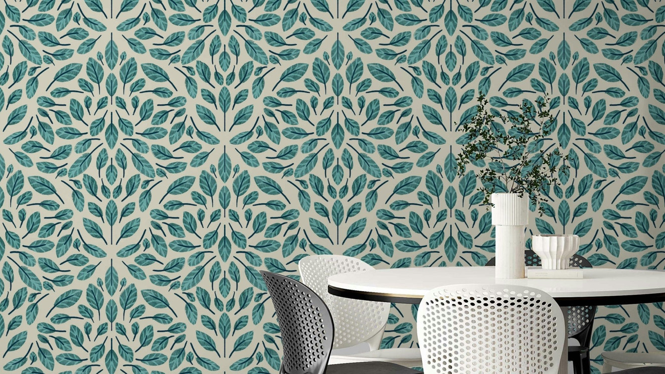 Botanical wallpaper featuring soft teal leaves

