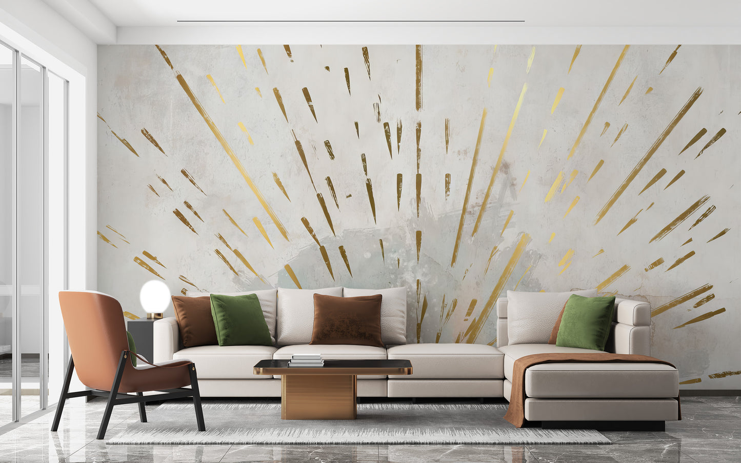 Aurora Gleam Abstract wallpaper mural of gold rays on cream behind a cream sectional sofa and orange armchair in a living room