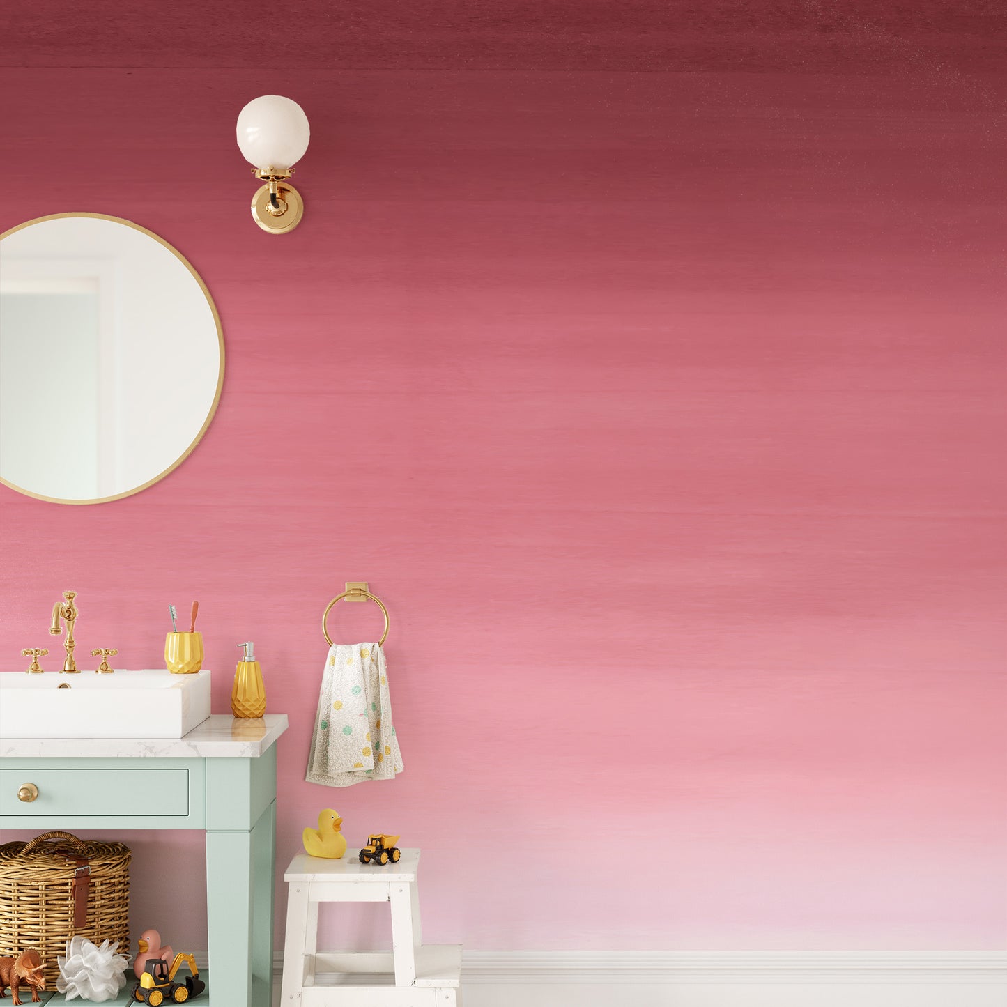 Cherry Blossom Panel wallpaper mural in deep-to-soft pink ombre on a kids bathroom wall with a mint vanity and gold mirror