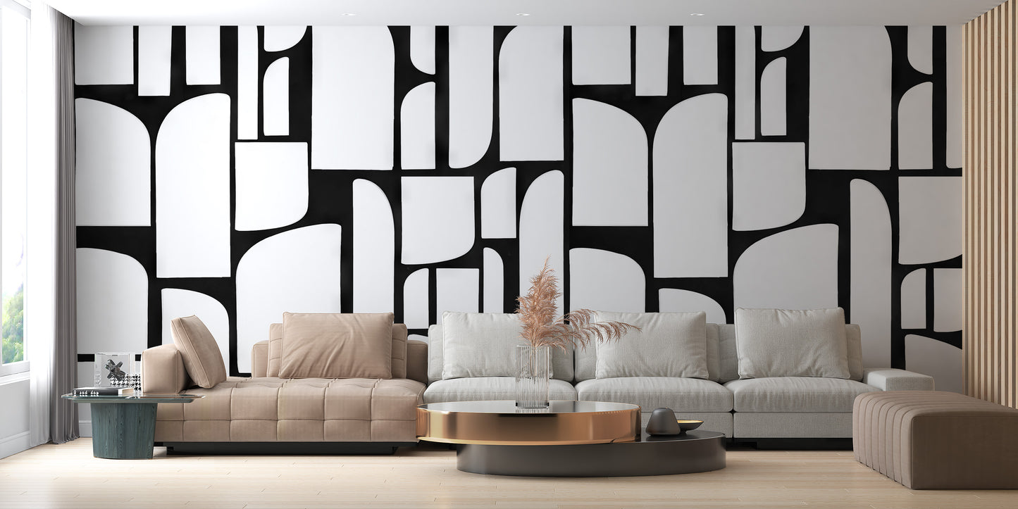 Monochrome Mosaic Tiles wallpaper mural in black and white behind a beige sectional sofa in a living room