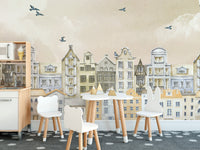 Parisian Dream Wall Mural peel and stick in a playroom with a small white table and two bunny chairs.