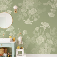Green Floral wallpaper mural in soft sage decorating a kids bathroom with mint vanity and gold round mirror