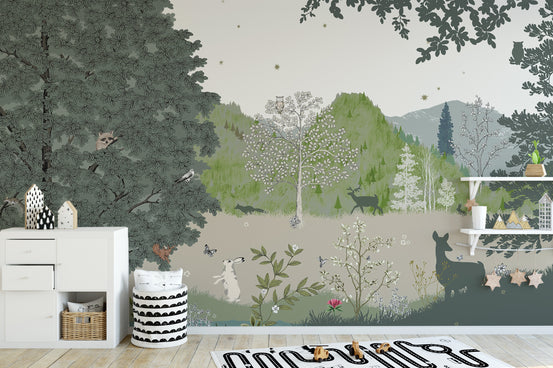 Kids Jungle wallpaper mural with green woodland trees and deer behind a white dresser in a kids room