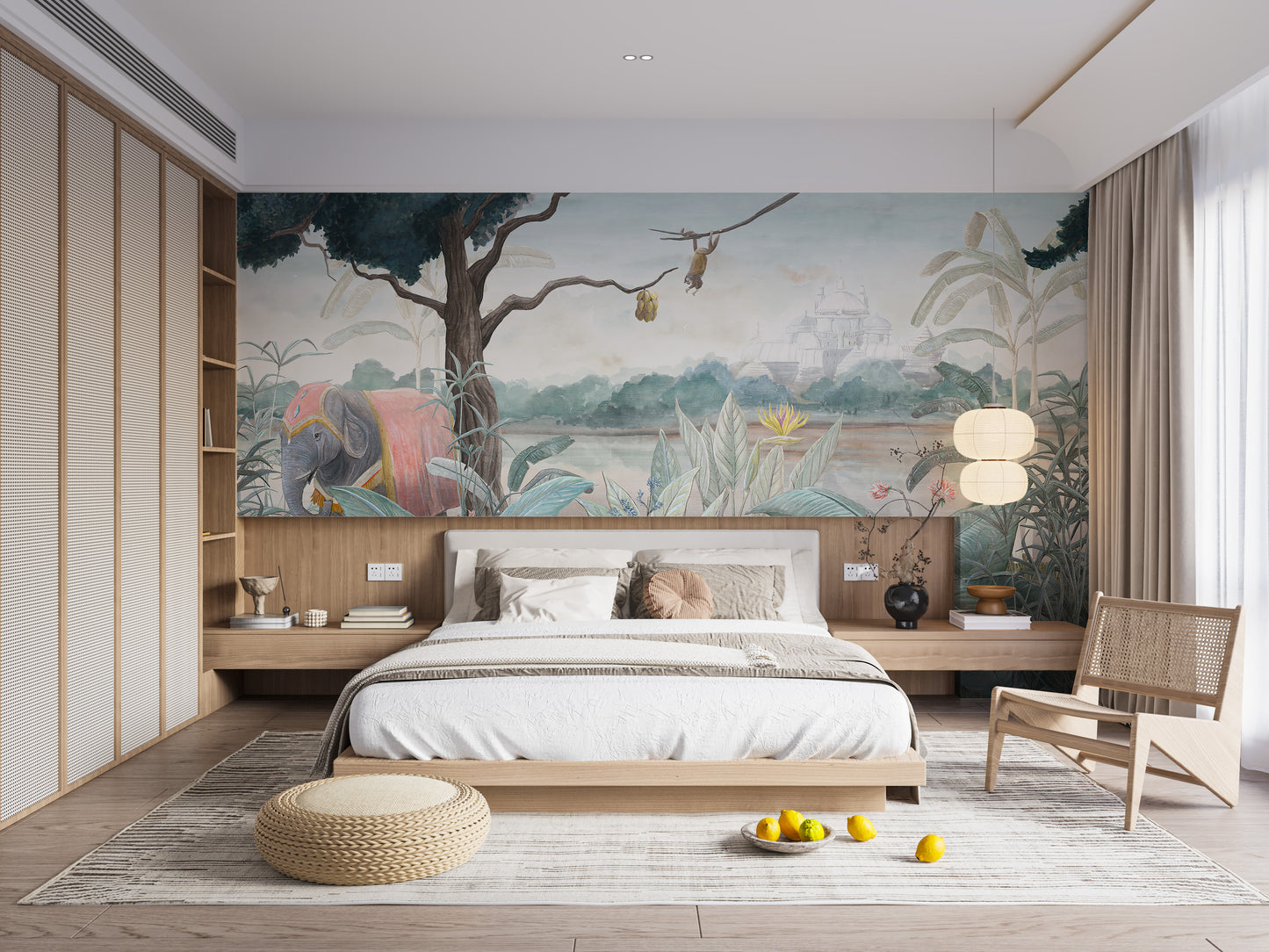 Royal Elephant wallpaper mural styled as a feature wall behind a dining table and chairs in green tones
