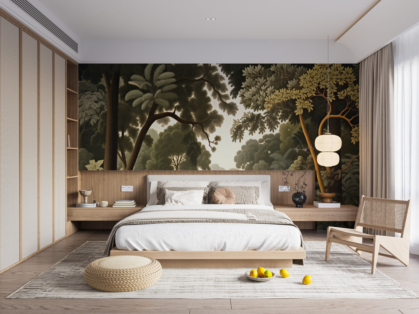 Woodcut Green Nature Botanical wallpaper of a leafy green landscape above a low platform bed and rattan chair in a bedroom