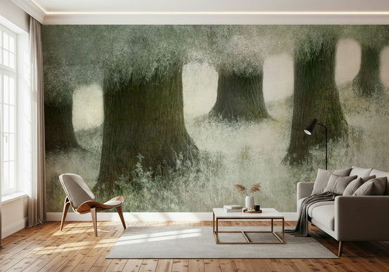 Silent Canopy wallpaper mural of misty green forest trunks behind a wooden chair and grey sofa in a bright living room