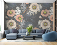 Sketch Flower wallpaper mural with peach and cream blooms on grey behind a blue sectional sofa