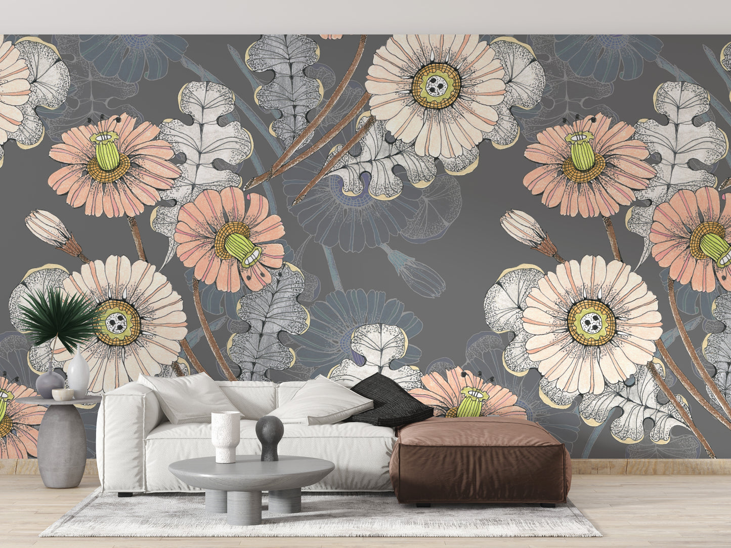 Sketch Flower wallpaper mural in peach and grey above a white sofa and brown leather ottoman