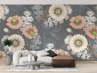 Sketch Flower wallpaper mural in peach and grey above a white sofa and brown leather ottoman