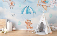 Dreamy Sky Adventure wallpaper mural with flying teddy bears in a kids room with white teepee tent and toy bunnies