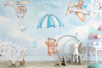 Dreamy Sky Adventure wallpaper mural with parachuting teddy bears in a nursery with wooden toy pram and star shelf