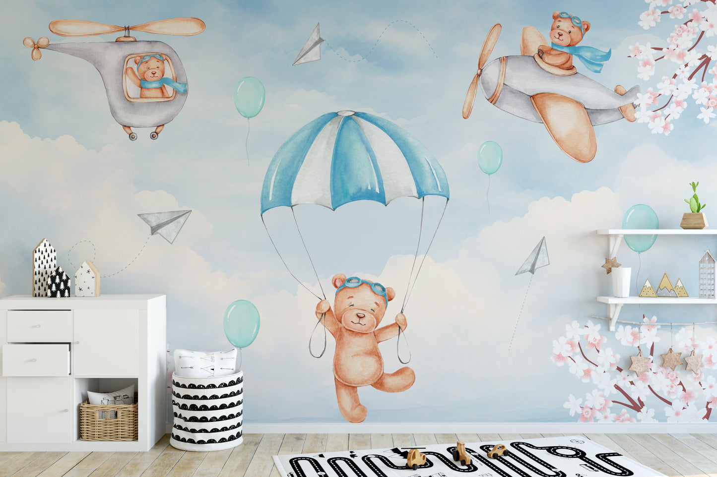 Dreamy Sky Adventure wallpaper mural of teddy bears flying in a blue sky in a kids room with white dresser and toy-car rug