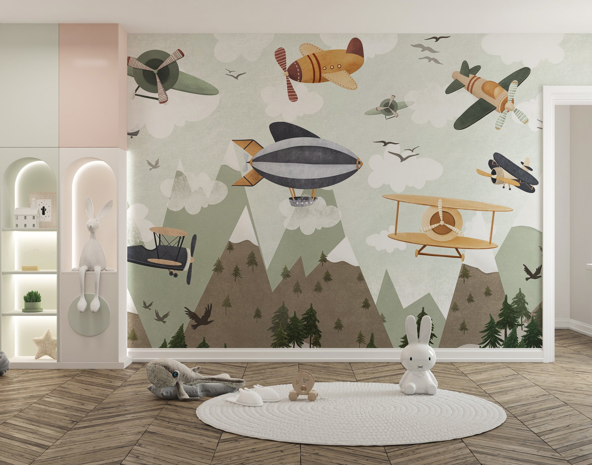 Skyward Adventure wallpaper mural with vintage planes and a grey airship over pine mountains in a kids room with a white bunny figurine