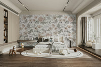Sleeping Woodland wallpaper mural behind a cream bed with a floating desk and toy horse