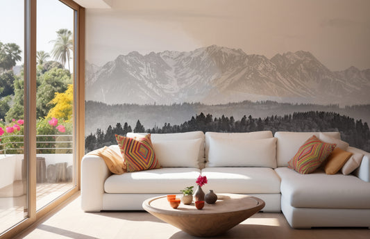 Snow Covered Mountains Winter wallpaper mural in sepia behind a white sectional sofa in a sunlit living room