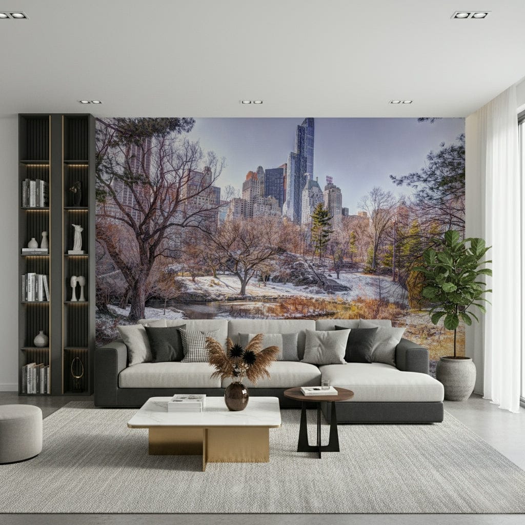 Snowy Central Park mural above a grey sofa-and-chaise sectional with a tall bookshelf and fiddle-leaf fig