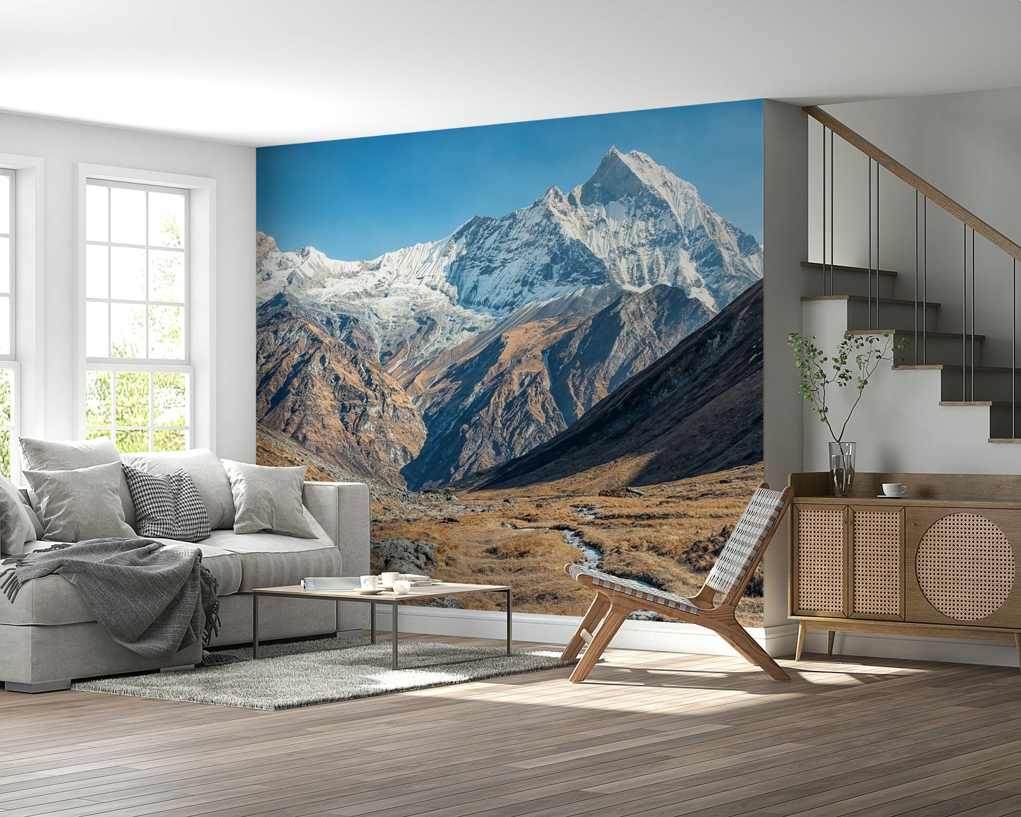 Snowy Peaks wall mural showing snow-capped mountains under a clear sky in a living room