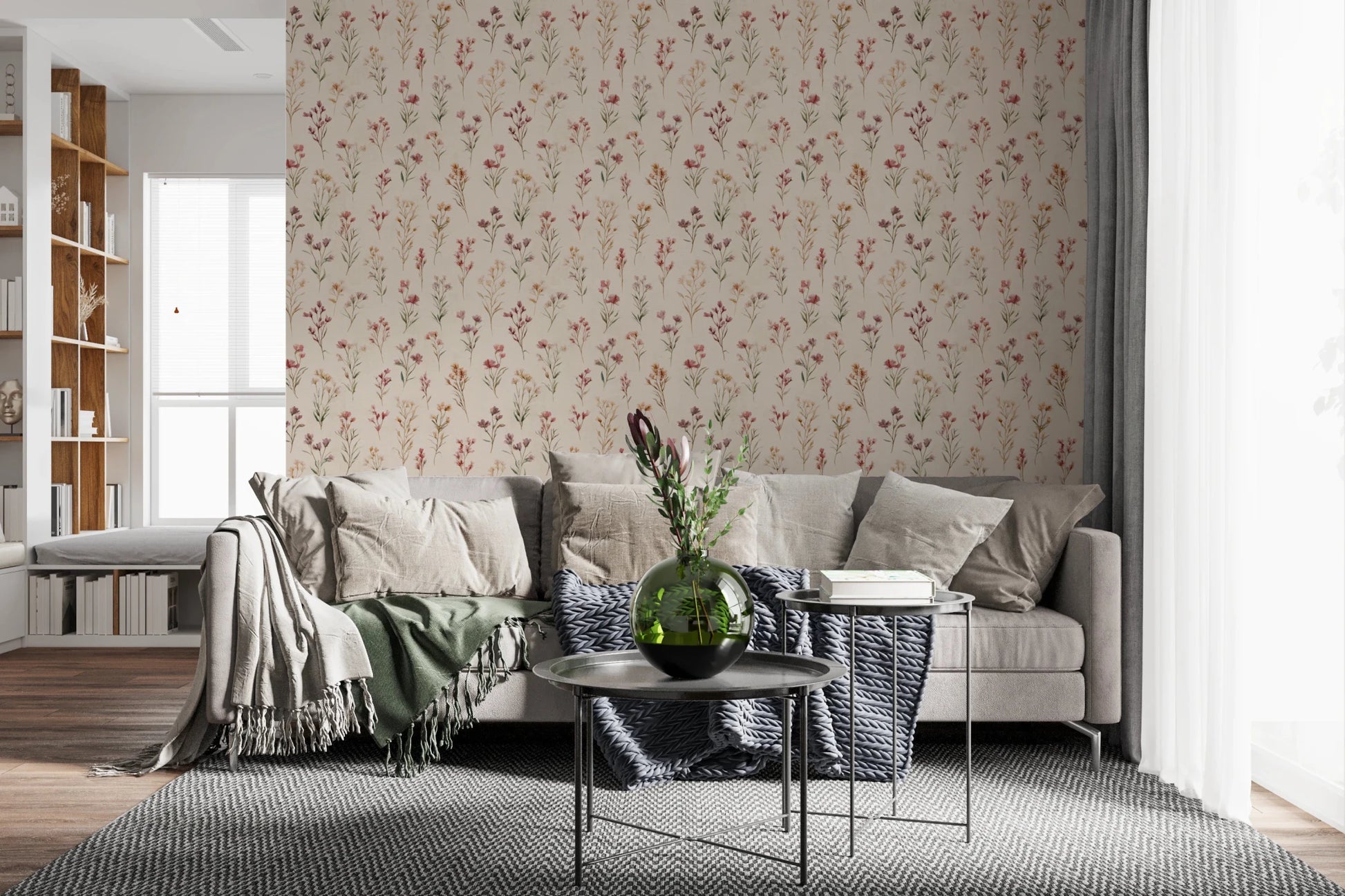 Soft Floral Whispers wallpaper of scattered blooms behind a beige sectional with round metal tables