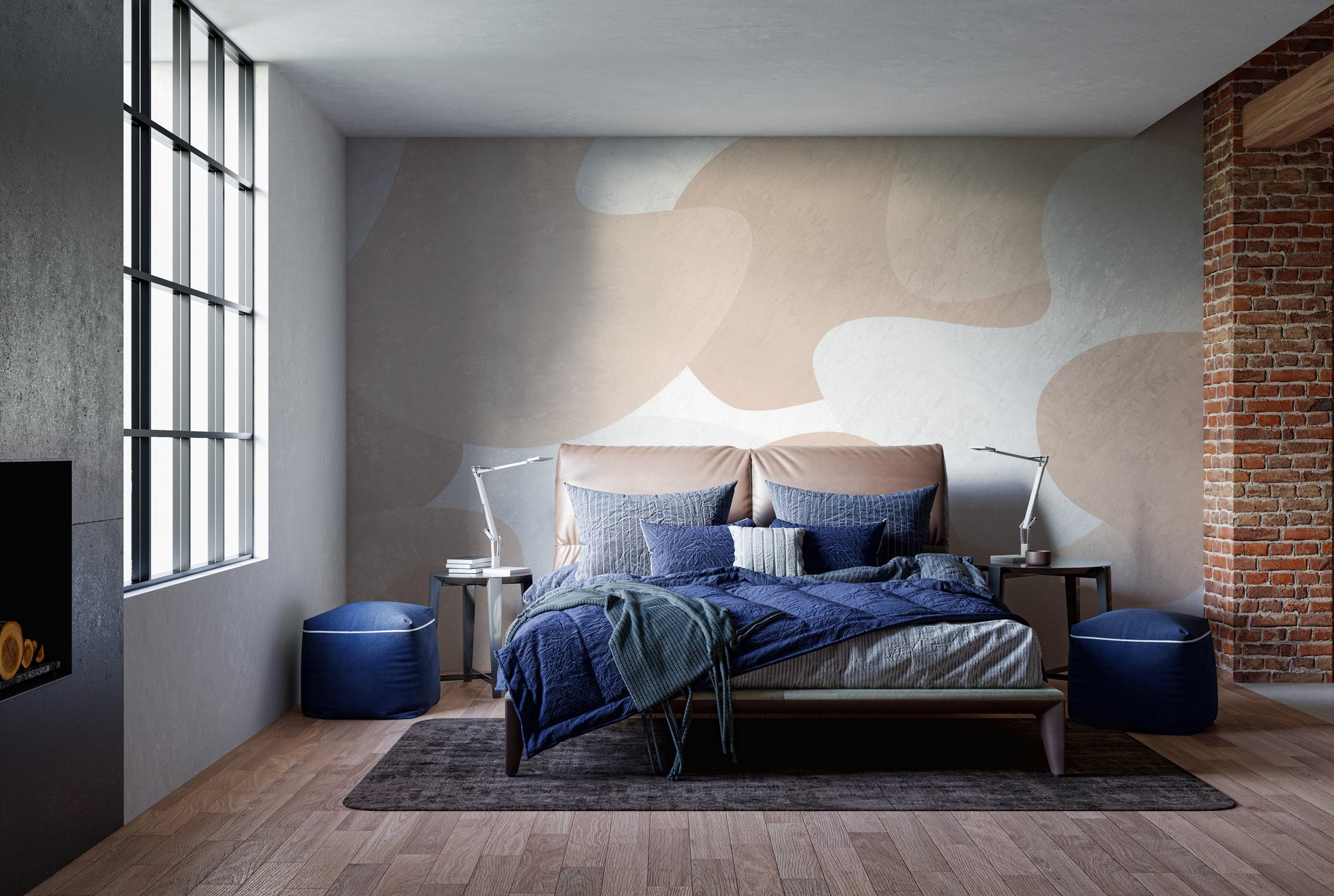 Soft Pastel Abstract wallpaper mural in peach and gray shapes behind a navy-bedded bed in a loft bedroom with brick
