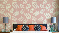 A photo-realistic wall mural with a repeating pattern of soft pink leaves.

