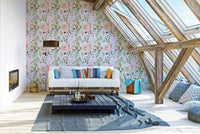 A peaceful painted floral mural on decorative wallpaper.

