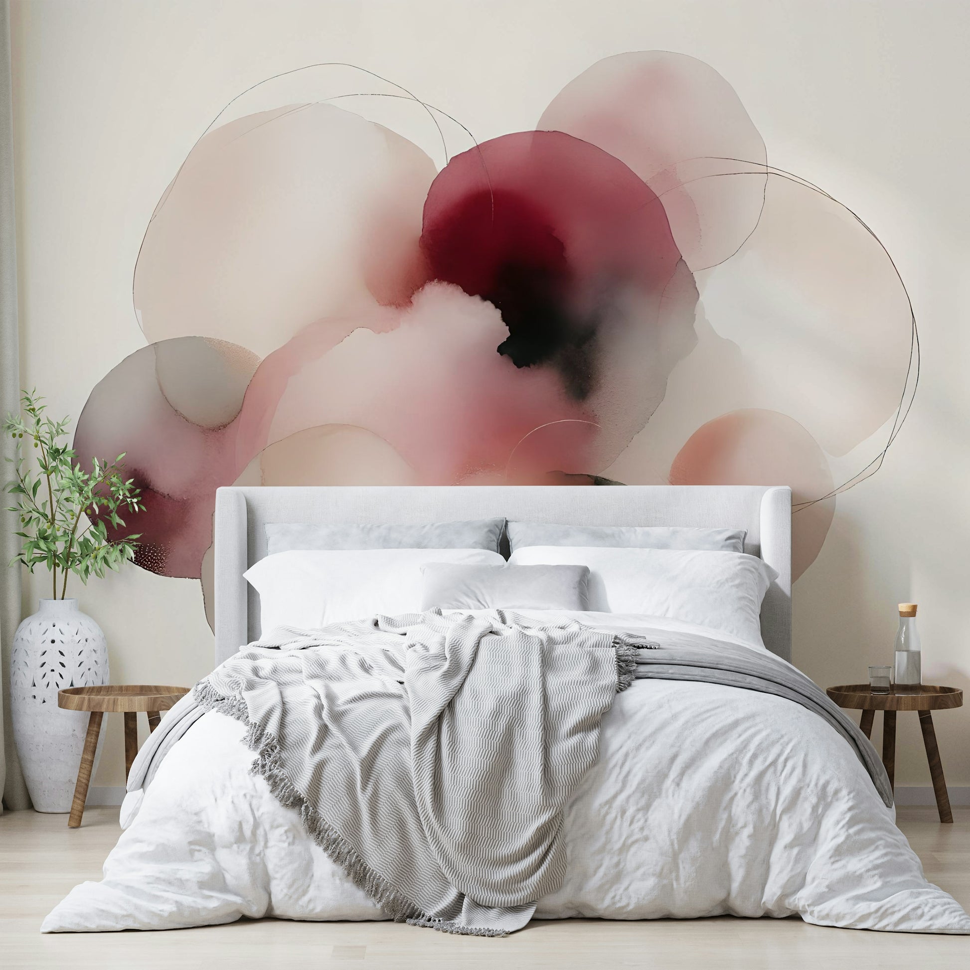 Abstract fluid wallpaper in beige and cream for a master bedroom accent wall.