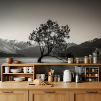 Majestic snow capped range behind Solitary Woodland mural wallpaper scenic view.