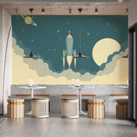 Launch Rocket Kids Cartoon wallpaper mural styled as a feature wall behind a dining table and chairs in green tones