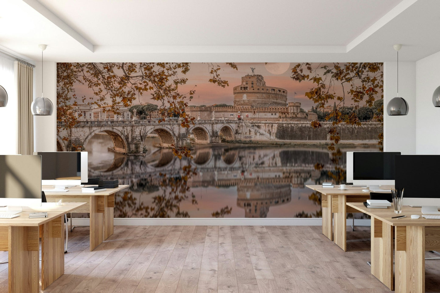 The calm water reflects the castle and the large moon.

