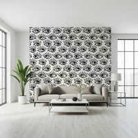 Wall mural depicting abstract staring eyes in shades of gray and black.