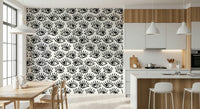 Wall mural with captivating staring eyes in monochrome tones for statement walls.
