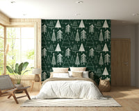 A charming winter wallpaper featuring simple sketched trees and bright star shapes.
