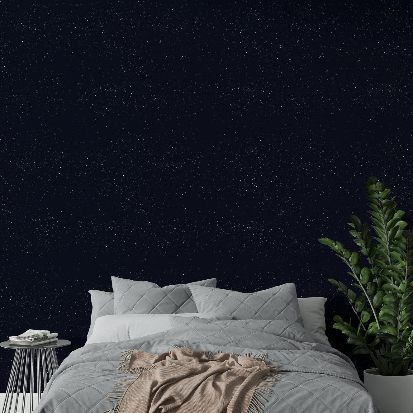 Navy blue starry sky wallpaper for a modern bedroom.
