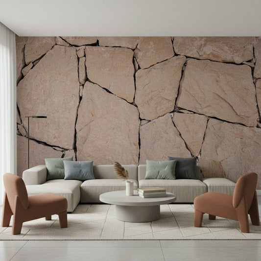 Stone Cladding Texture wallpaper mural in beige flagstone behind a cream sofa and terracotta armchairs in a living room