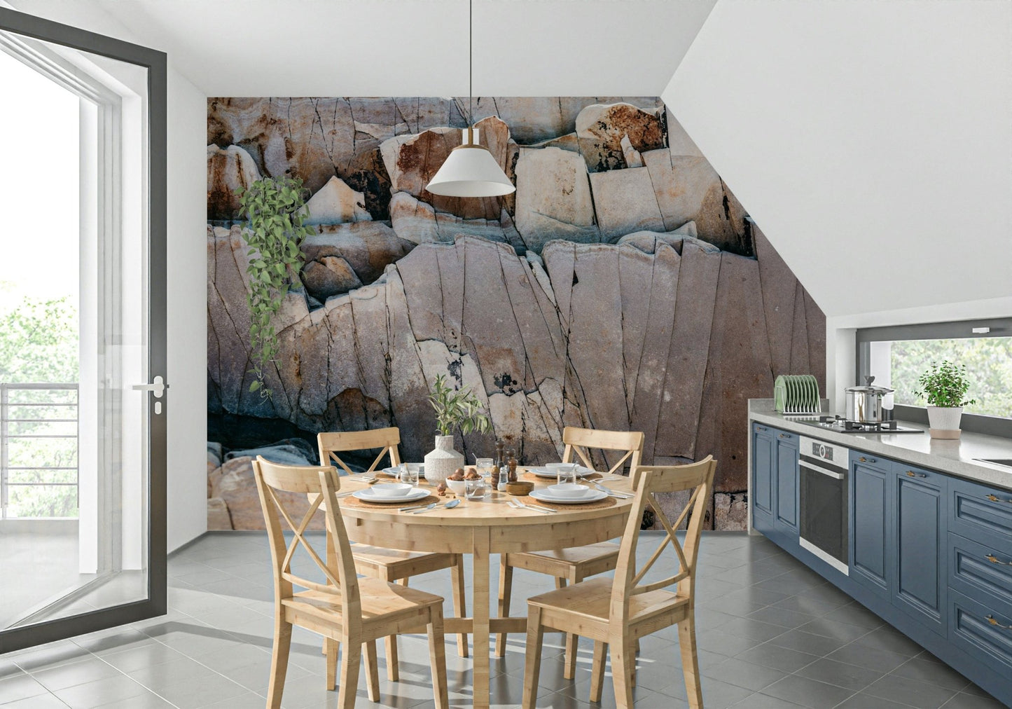 Stone Geometry wallpaper mural of cracked rock in a kitchen nook with round wood table and blue-grey cabinets